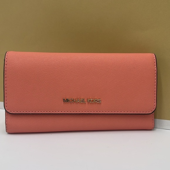 MICHAEL KORS JET SET TRAVEL LARGE TRIFOLD WALLET SHERBERT COLOR
NWT - Picture 9 of 16